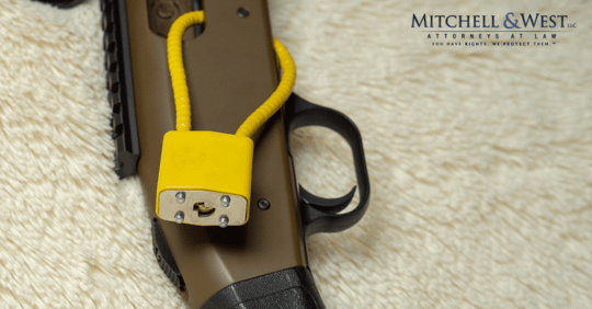 yellow lock on firearm to prevent an accident