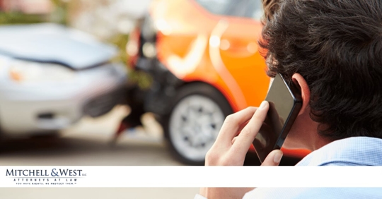 man on the phone with an insurance adjuster