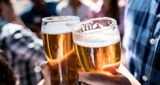 cheers with two beer glasses